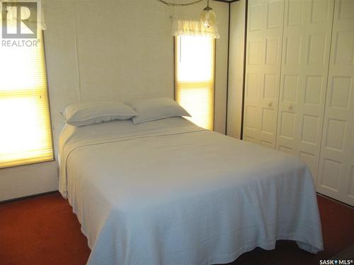 4 Highland Avenue, Bayview Heights, Jackfish Murray, SK - Indoor Photo Showing Bedroom