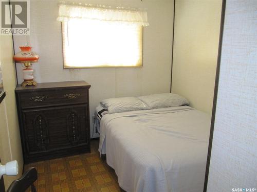 4 Highland Avenue, Bayview Heights, Jackfish Murray, SK - Indoor Photo Showing Bedroom