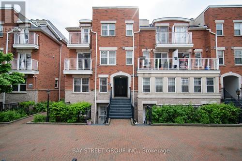 24 - 37 Four Winds Drive, Toronto, ON - Outdoor With Balcony With Facade