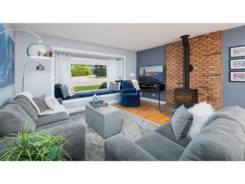 2105 Maple Place, Creston, BC - Indoor Photo Showing Living Room With Fireplace