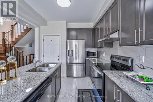 23 Auckland Drive, Whitby, ON - Indoor Photo Showing Kitchen With Double Sink With Upgraded Kitchen