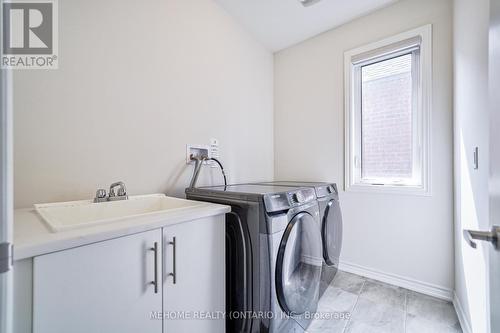 23 Auckland Drive, Whitby, ON - Indoor Photo Showing Laundry Room