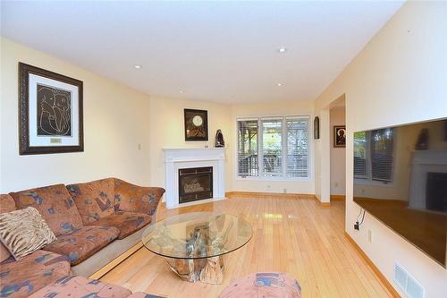 110 Highbury Drive, Stoney Creek, ON - Indoor Photo Showing Living Room With Fireplace