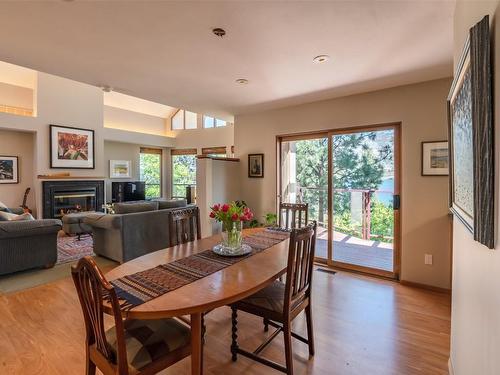 230 Ponderosa Avenue, Kaleden, BC - Indoor Photo Showing Dining Room With Fireplace