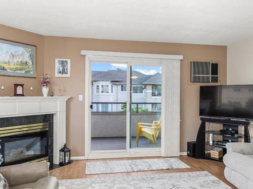209-3854 Brown Road, West Kelowna, BC - Indoor Photo Showing Living Room With Fireplace