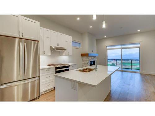 1428 Tower Ranch Drive, Kelowna, BC - Indoor Photo Showing Kitchen With Double Sink With Upgraded Kitchen