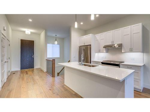 1428 Tower Ranch Drive, Kelowna, BC - Indoor Photo Showing Kitchen With Double Sink With Upgraded Kitchen