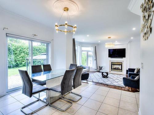 Dining room - 280 Boul. De Fontainebleau, Blainville, QC - Indoor Photo Showing Dining Room With Fireplace