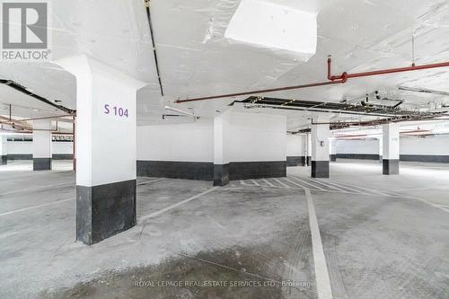 221 - 1070 Douglas Mccurdy Common, Mississauga, ON - Indoor Photo Showing Garage