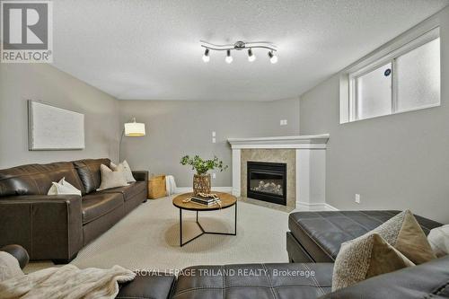 2888 Biddulph Street, London, ON - Indoor Photo Showing Living Room With Fireplace