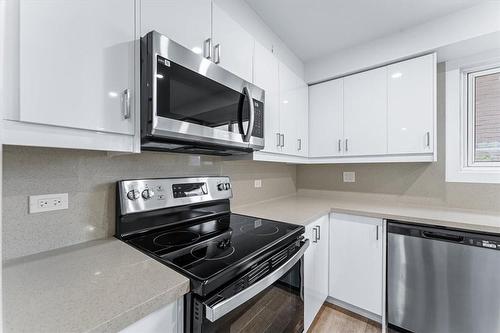 Upper - 10 Jamie Ann Street, Hamilton, ON - Indoor Photo Showing Kitchen With Stainless Steel Kitchen