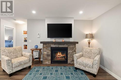 49&51 Dewal Place, Belleville, ON - Indoor Photo Showing Living Room With Fireplace