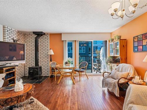 3-210 Douglas St, Victoria, BC - Indoor Photo Showing Living Room With Fireplace