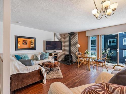 3-210 Douglas St, Victoria, BC - Indoor Photo Showing Living Room With Fireplace