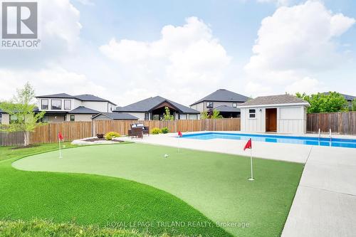 Putting green, pool and cabana - 2430 Brayford Crescent, London, ON - Outdoor With In Ground Pool With Backyard