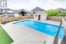 Pool and cabana - 2430 Brayford Crescent, London, ON  - Outdoor With In Ground Pool With Backyard 