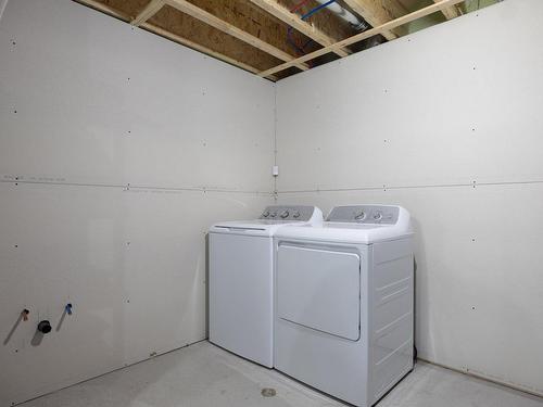 Basement - 255 Ch. Ravary, Rivière-Beaudette, QC - Indoor Photo Showing Laundry Room