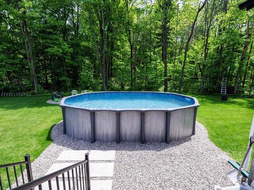Pool - 255 Ch. Ravary, Rivière-Beaudette, QC - Outdoor With Above Ground Pool With Backyard