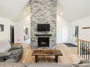 Living room - 255 Ch. Ravary, Rivière-Beaudette, QC  - Indoor Photo Showing Living Room With Fireplace 