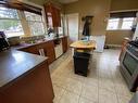 355 Hudson Bay Street, Out Of District, BC  - Indoor Photo Showing Kitchen With Double Sink 
