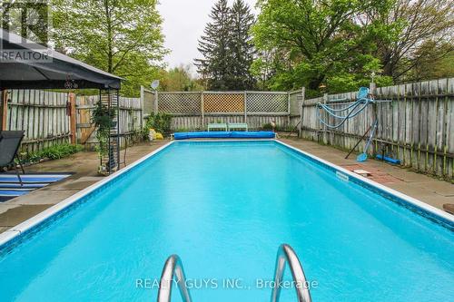 99 Pontypool Road, Kawartha Lakes, ON - Outdoor With In Ground Pool With Backyard