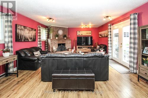 99 Pontypool Road, Kawartha Lakes, ON - Indoor Photo Showing Living Room With Fireplace