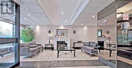 211 - 1300 Mississauga Vly Boulevard, Mississauga, ON - Indoor With Fireplace