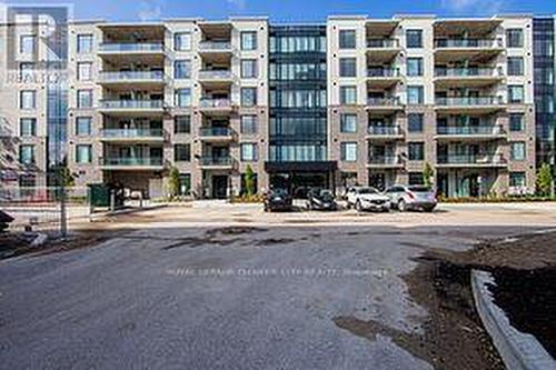 108 - 103 Roger Street E, Waterloo, ON - Outdoor With Balcony With Facade