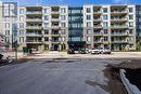 108 - 103 Roger Street E, Waterloo, ON  - Outdoor With Balcony With Facade 