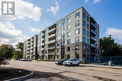 108 - 103 Roger Street E, Waterloo, ON - Outdoor With Balcony With Facade