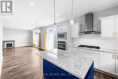 4184 Village Creek Drive, Fort Erie, ON - Indoor Photo Showing Kitchen With Fireplace With Upgraded Kitchen