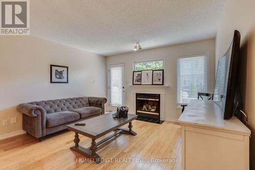 80 - 320 Ambleside Drive, London, ON - Indoor Photo Showing Living Room With Fireplace