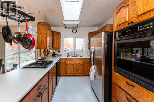 7946 St John Crescent, Prince George, BC - Indoor Photo Showing Kitchen With Double Sink