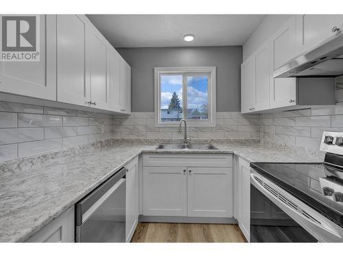1308 Diefenbaker Drive, Prince George, BC - Indoor Photo Showing Kitchen With Double Sink With Upgraded Kitchen