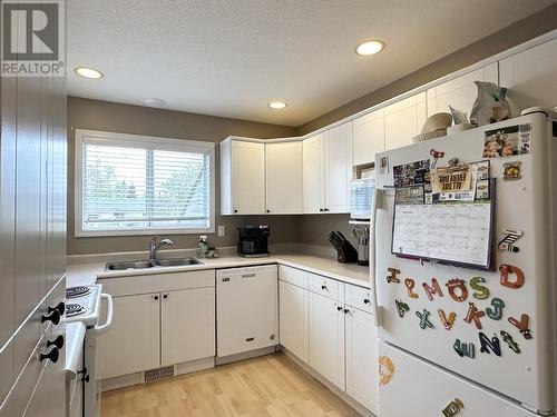106 2423 8Th Avenue, Prince George, BC - Indoor Photo Showing Kitchen With Double Sink