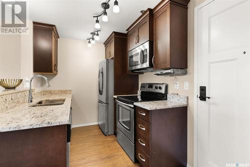 411 1220 Blackfoot Drive, Regina, SK - Indoor Photo Showing Kitchen With Double Sink