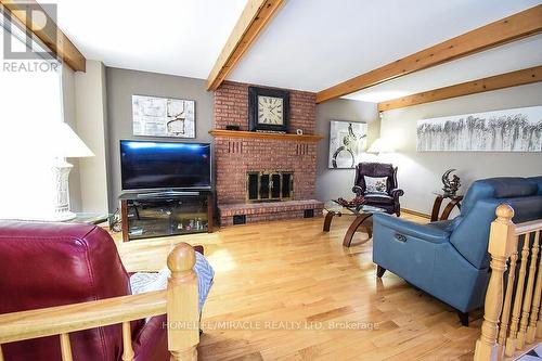 3 Barbican Trail, St. Catharines, ON - Indoor Photo Showing Living Room With Fireplace