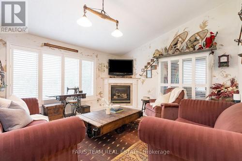 185 Tyrolean Lane, Blue Mountains, ON - Indoor Photo Showing Living Room With Fireplace