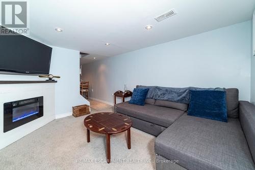 32 Bayfield Avenue, Hamilton, ON - Indoor Photo Showing Living Room With Fireplace