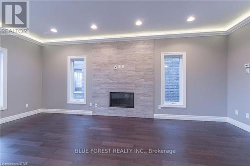 33 Woodland Walk, Southwold, ON - Indoor Photo Showing Other Room With Fireplace