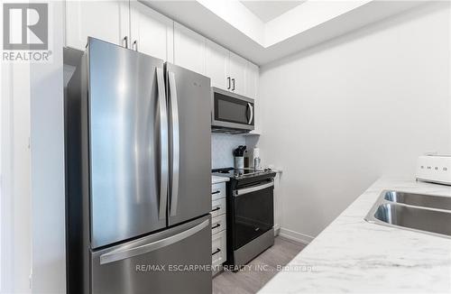 311 - 460 Dundas Street E, Hamilton, ON - Indoor Photo Showing Kitchen With Double Sink