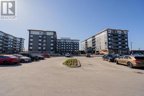 322 - 251 Northfield Drive E, Waterloo, ON - Outdoor With Balcony With Facade