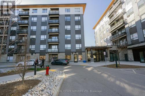 322 - 251 Northfield Drive E, Waterloo, ON - Outdoor With Balcony With Facade