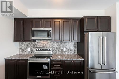 423 - 150 Oak Park Boulevard, Oakville, ON - Indoor Photo Showing Kitchen With Stainless Steel Kitchen
