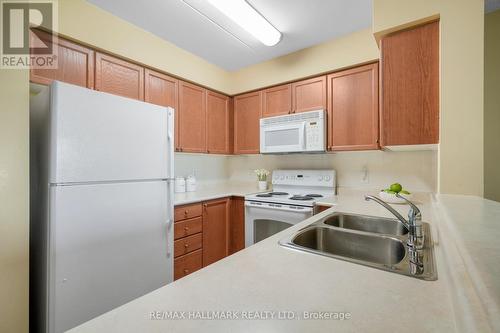 302 - 35 Via Rosedale Way, Brampton, ON - Indoor Photo Showing Kitchen With Double Sink