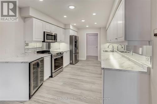 202 - 10 Old Mill Trail, Toronto, ON - Indoor Photo Showing Kitchen