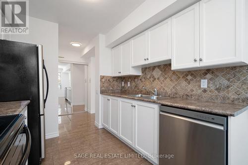 210 - 1 Emerald Lane, Vaughan, ON - Indoor Photo Showing Kitchen With Double Sink