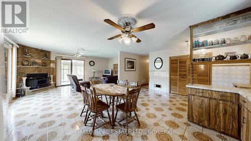 229 Holmes Point Road, Georgina, ON - Indoor Photo Showing Dining Room With Fireplace