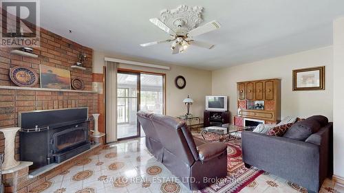 229 Holmes Point Road, Georgina, ON - Indoor Photo Showing Living Room With Fireplace