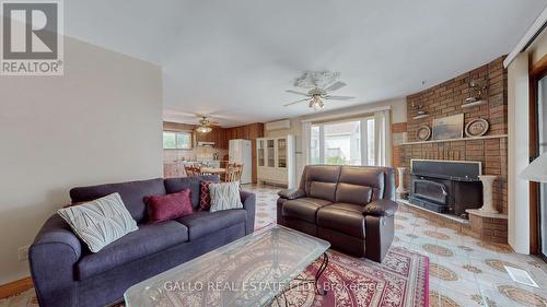 229 Holmes Point Road, Georgina, ON - Indoor Photo Showing Living Room With Fireplace